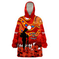 gold-coast-football-anzac-2023-wearable-blanket-hoodie-suns-aboriginal-mix-poppy-camouflage