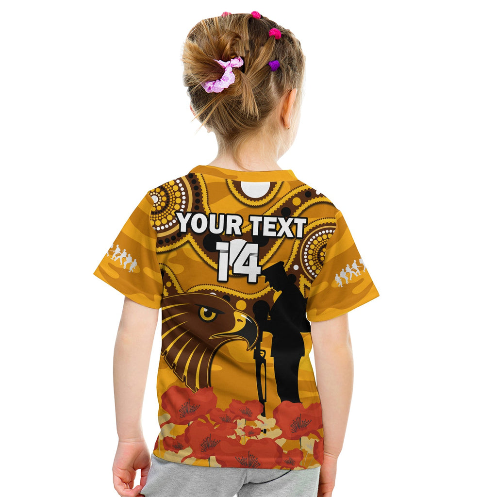 custom-text-and-number-hawks-football-anzac-2023-t-shirt-kid-indigenous-mix-poppy-camouflage