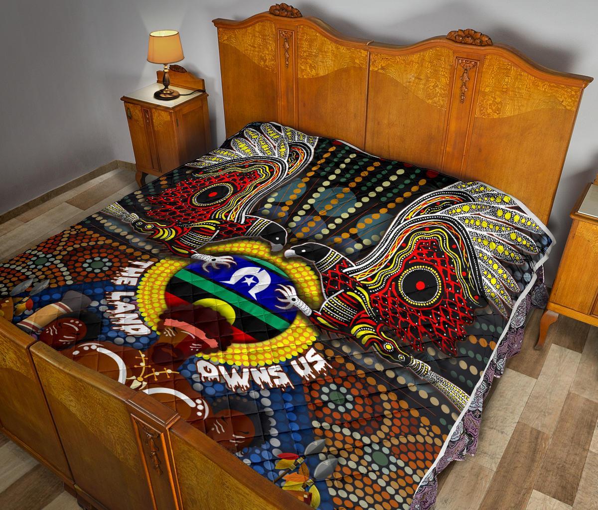 the-land-owns-us-premium-quilt