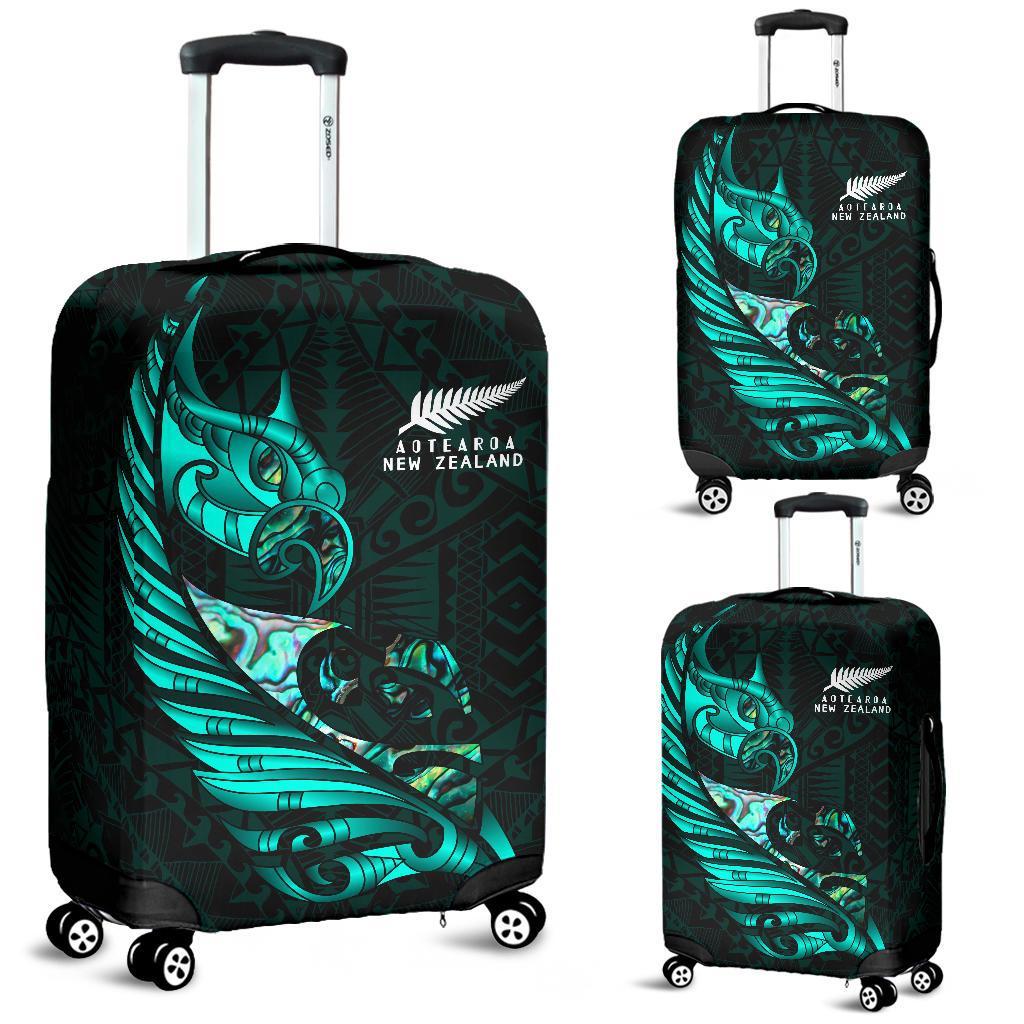 new-zealand-luggage-cover-manaia-paua-fern-wing-turquoise