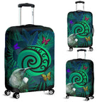 new-zealand-luggage-covers-koru-fern-mix-tui-bird-tropical-floral-turquoise