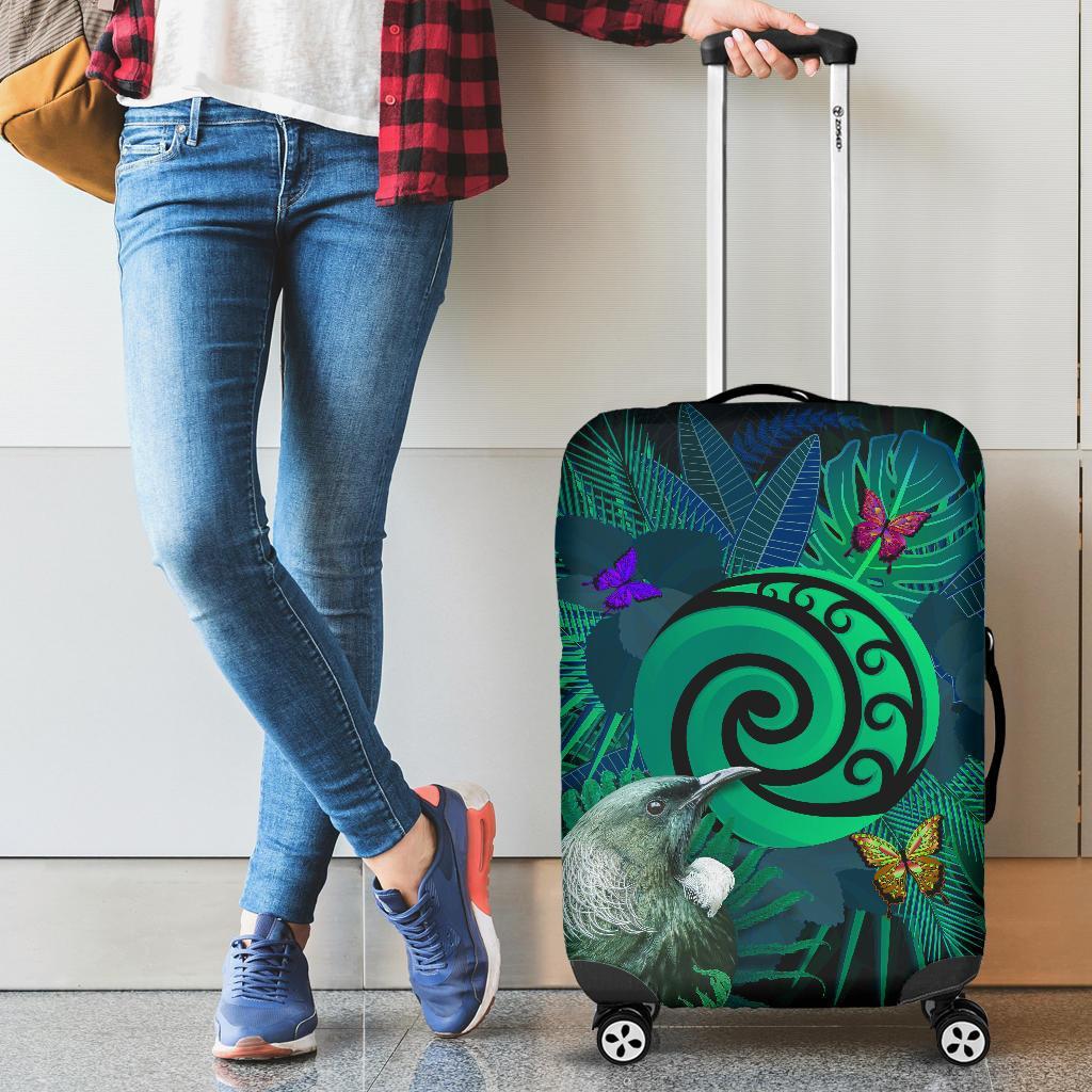 new-zealand-luggage-covers-koru-fern-mix-tui-bird-tropical-floral-turquoise