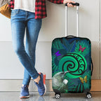 new-zealand-luggage-covers-koru-fern-mix-tui-bird-tropical-floral-turquoise
