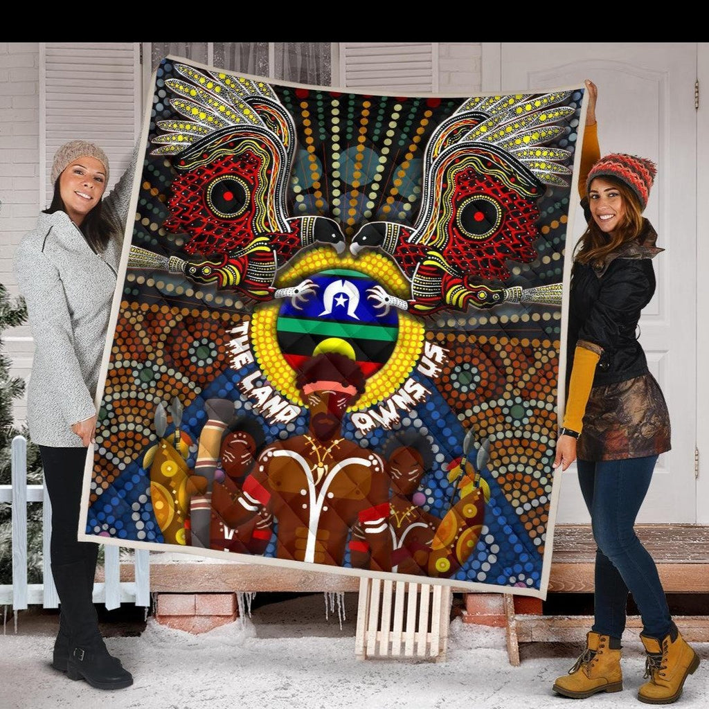 the-land-owns-us-premium-quilt