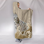 maori-manaia-the-blue-sea-hooded-blanket-golden