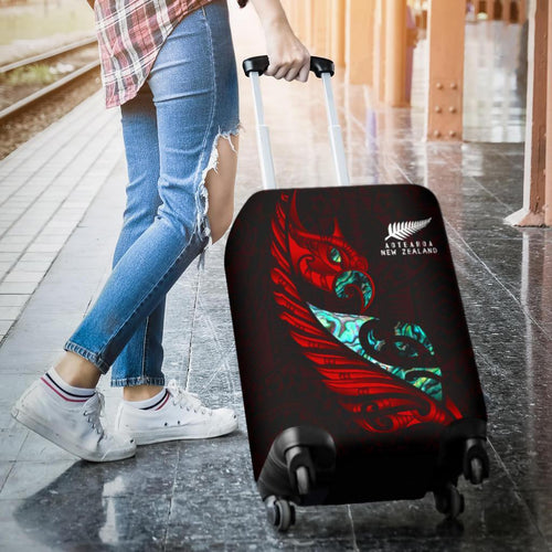 new-zealand-luggage-cover-manaia-paua-fern-wing-red