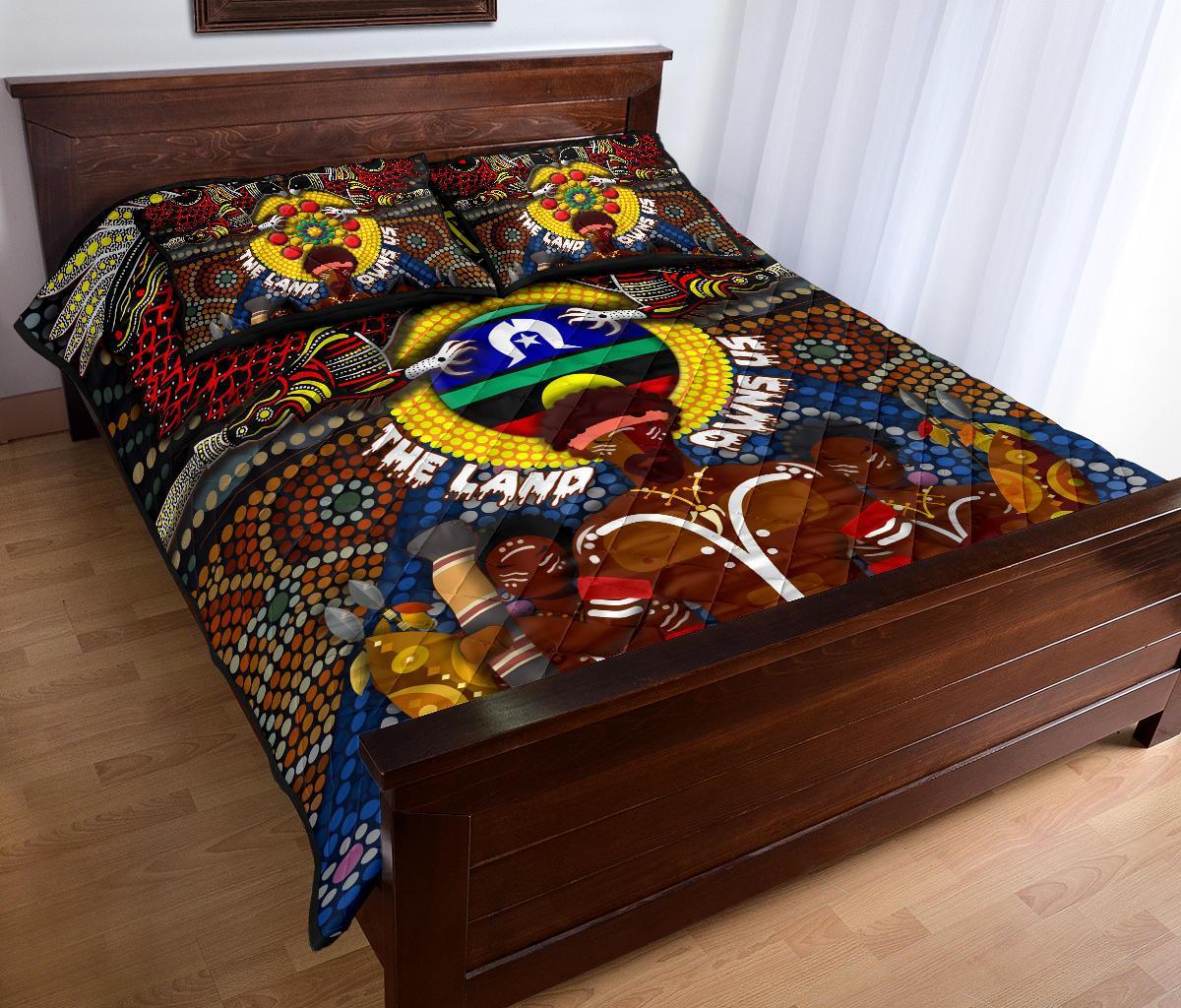 custom-text-the-land-owns-us-quilt-bed-set