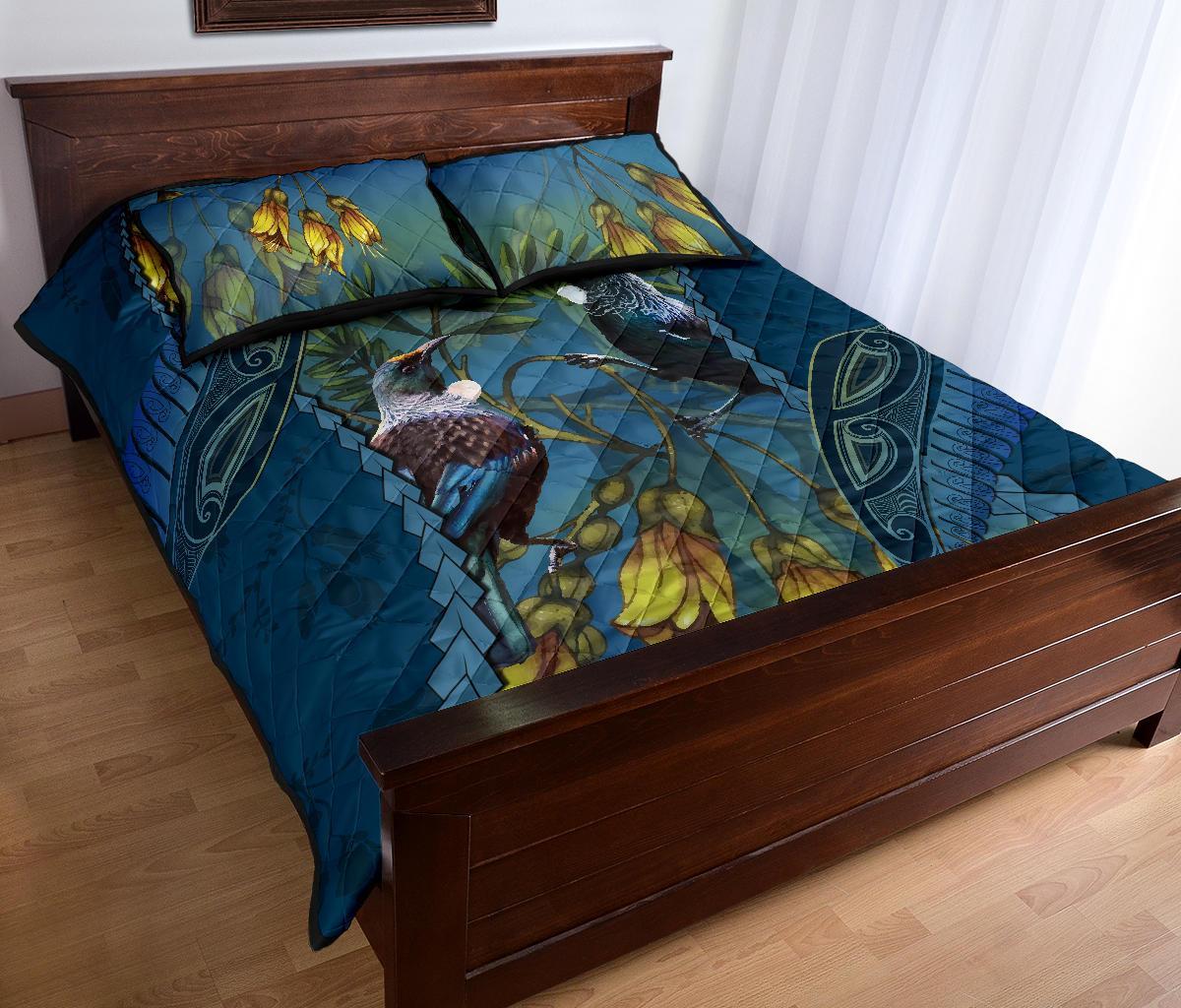 tui-bird-mix-kowhai-and-silver-fern-quilt-bed-set-blue