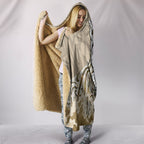 maori-manaia-the-blue-sea-hooded-blanket-golden