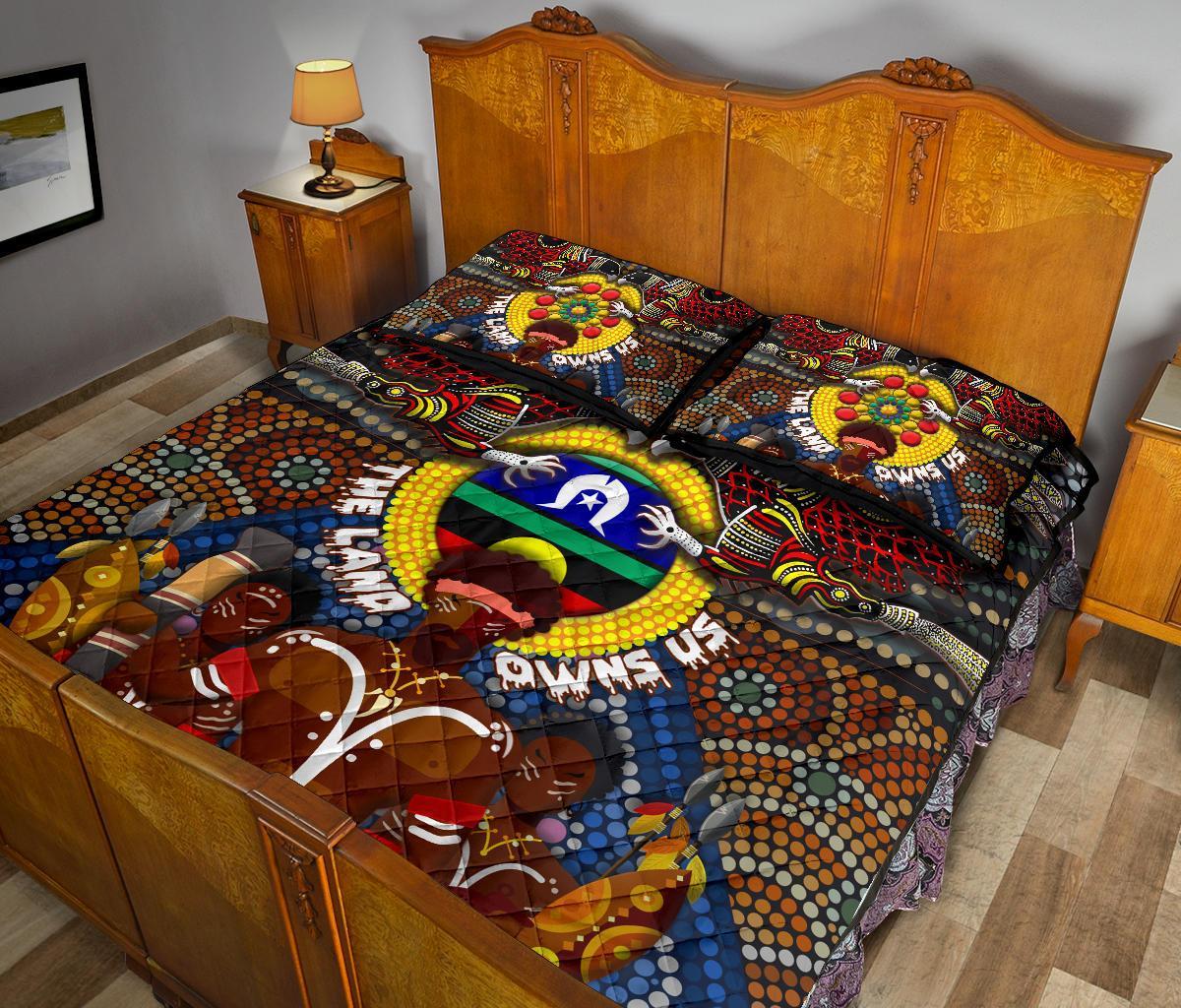 custom-text-the-land-owns-us-quilt-bed-set