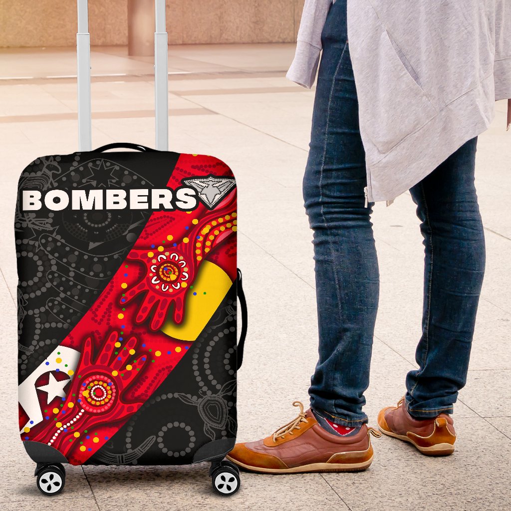 bombers-naidoc-week-luggage-covers-essendon-ingenious