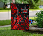 anzac-lest-we-forget-flag-poppy-flowers