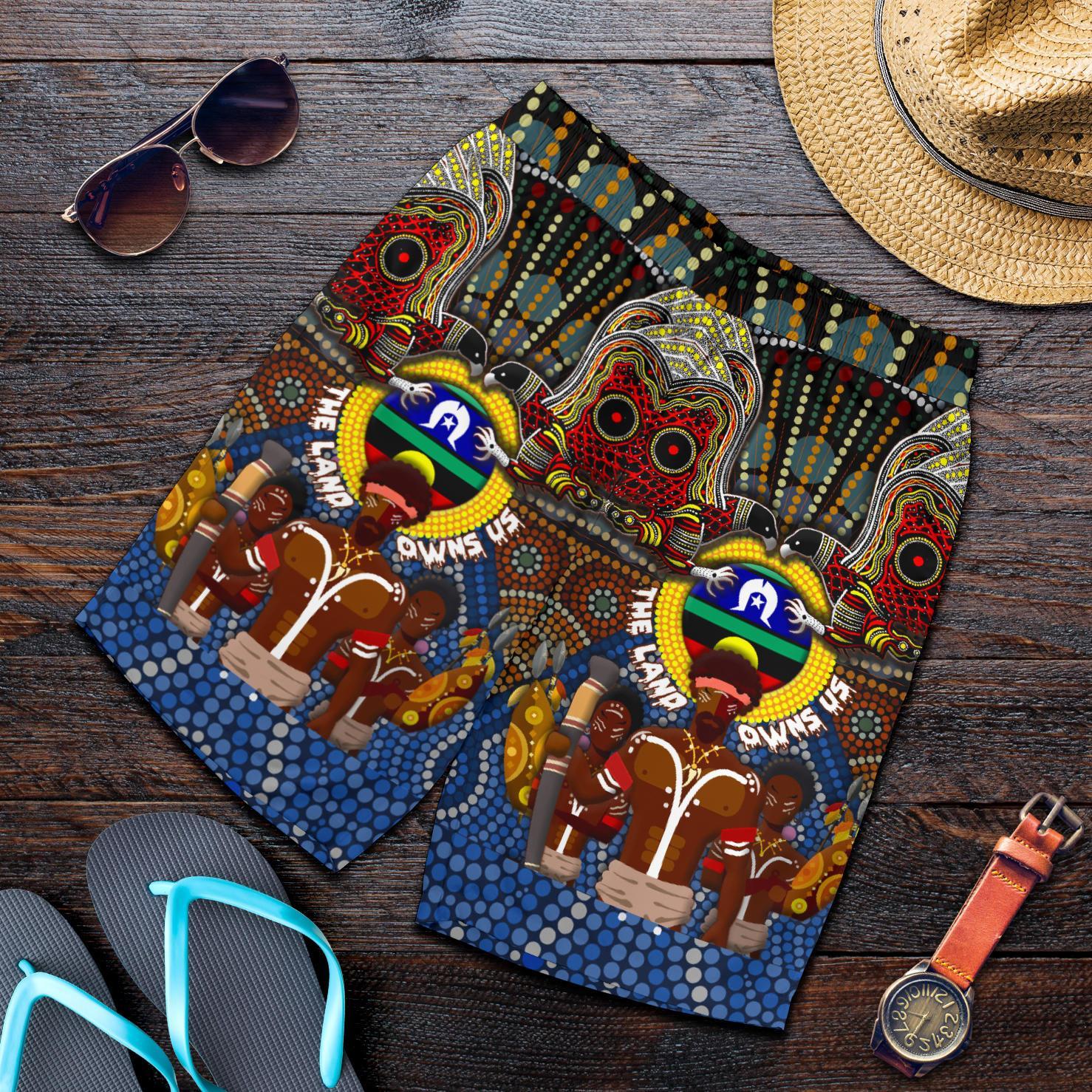 the-land-owns-us-all-over-print-mens-shorts