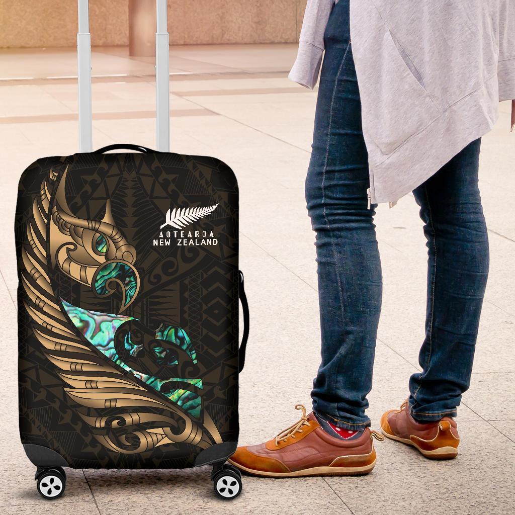 new-zealand-luggage-cover-manaia-paua-fern-wing-gold