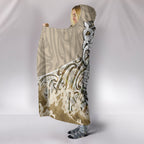 maori-manaia-the-blue-sea-hooded-blanket-golden