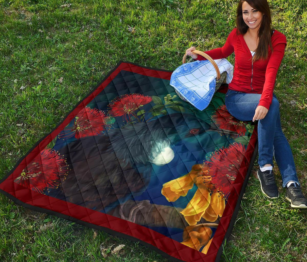 dreaming-tui-with-flowers-quilt
