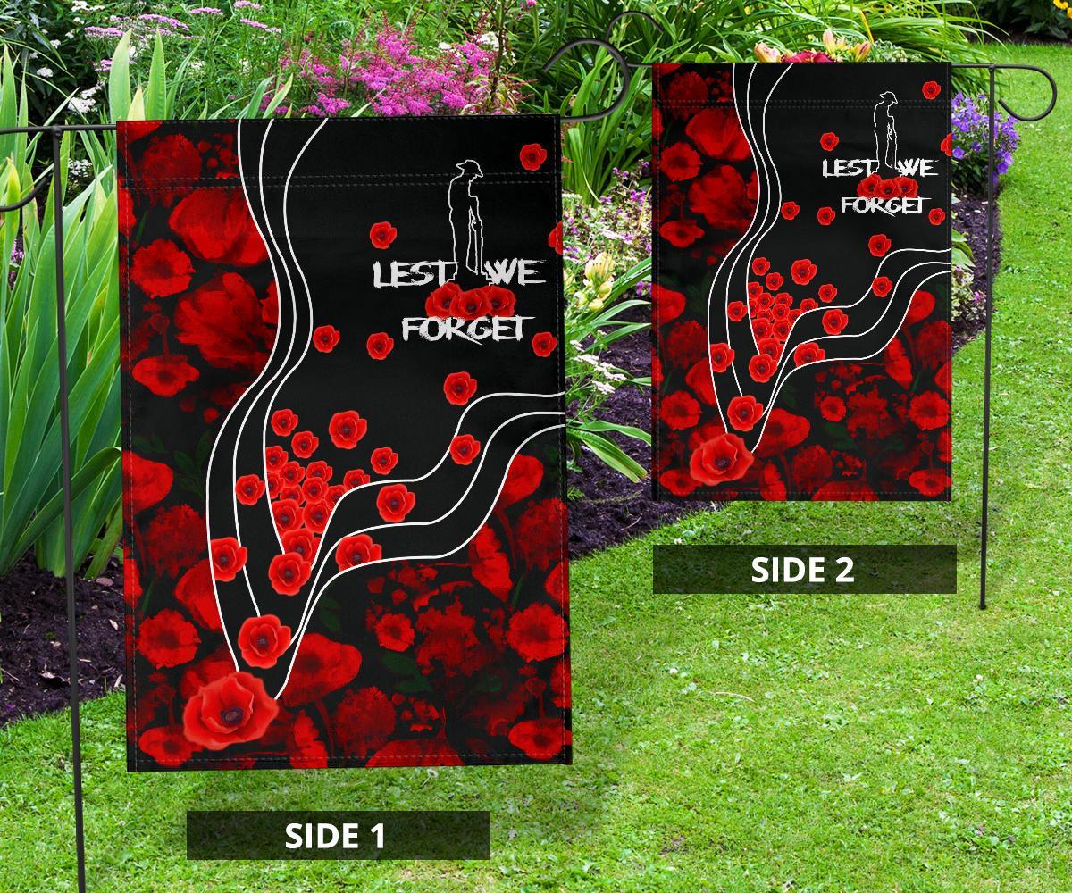 anzac-lest-we-forget-flag-poppy-flowers