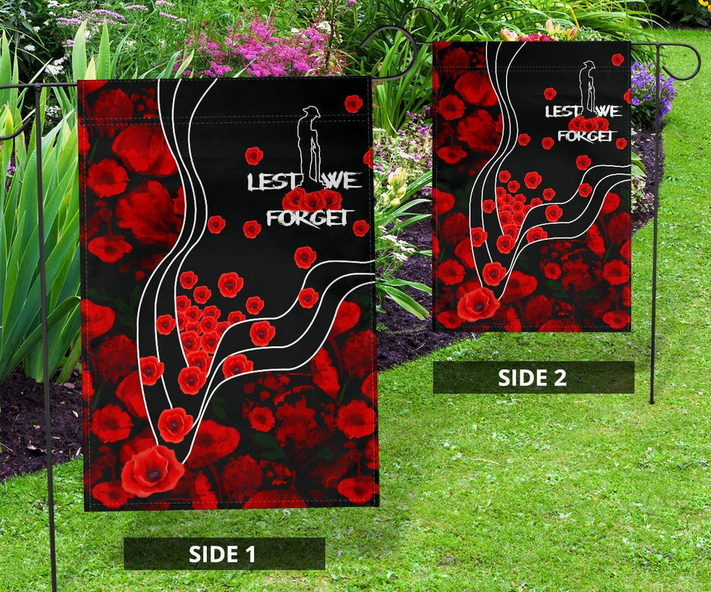 anzac-lest-we-forget-flag-poppy-flowers