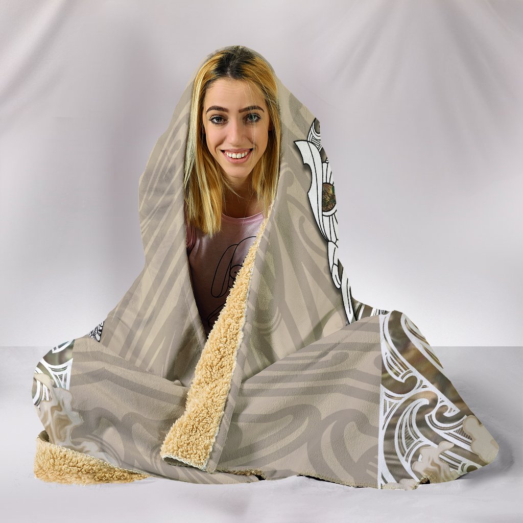 maori-manaia-the-blue-sea-hooded-blanket-golden