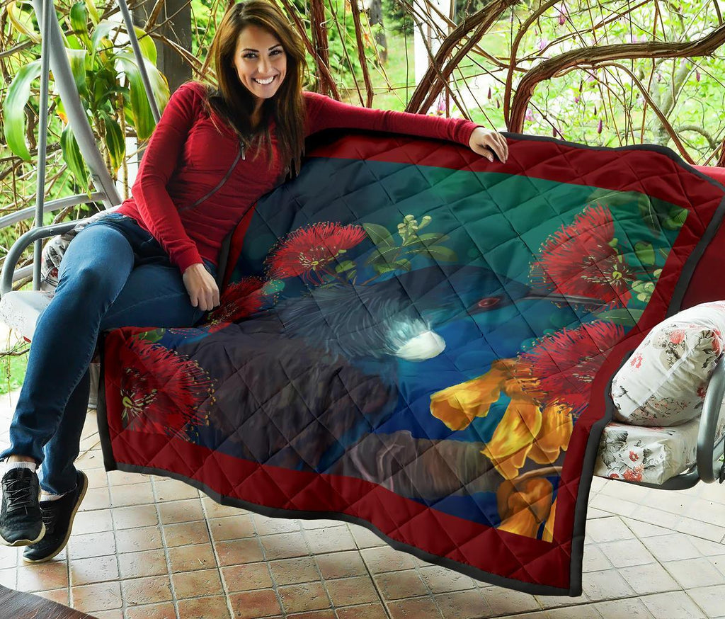 dreaming-tui-with-flowers-quilt
