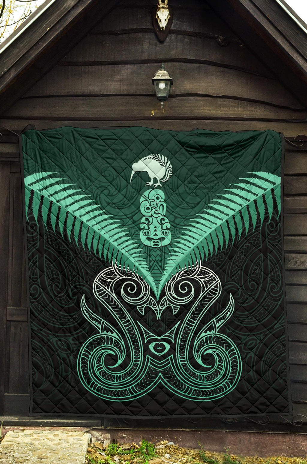 maori-manaia-new-zealand-premium-quilt-turquoise