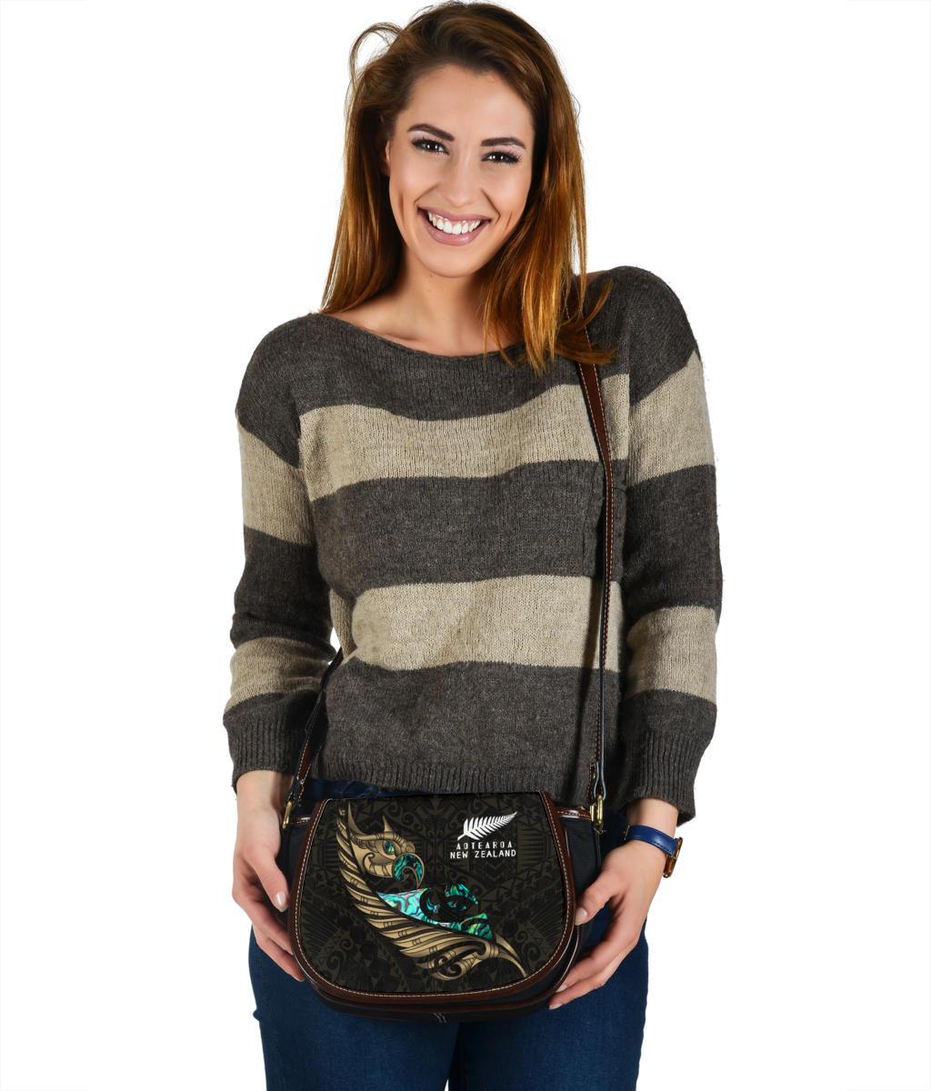 new-zealand-saddle-bag-manaia-paua-fern-wing-gold