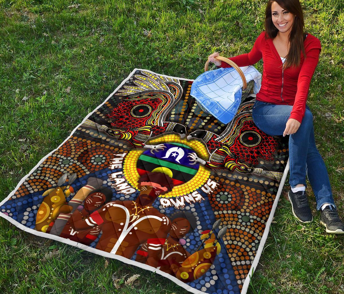 the-land-owns-us-premium-quilt