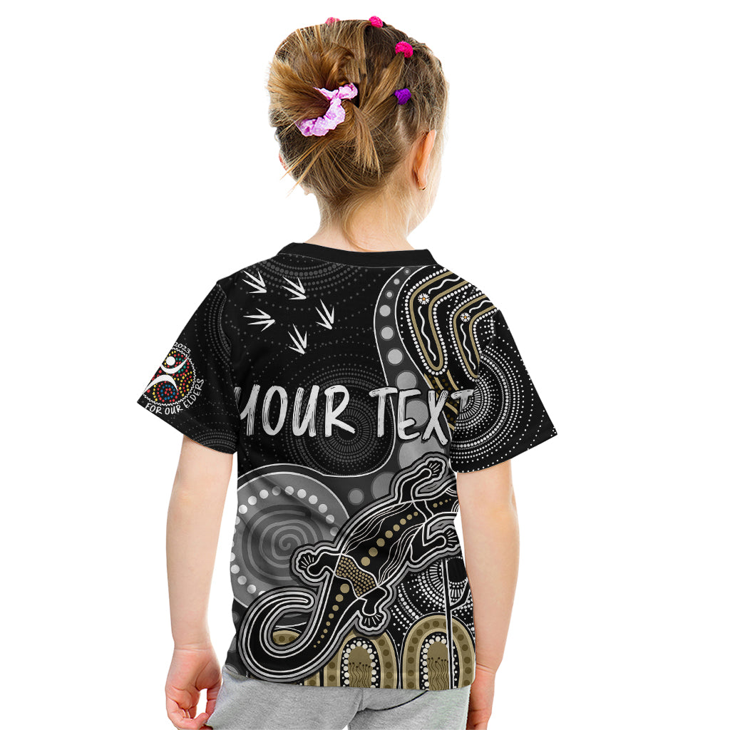 personalised-naidoc-week-2023-afl-magpies-kid-t-shirt-aboriginal-dot-art-lizard-mix-boomerang